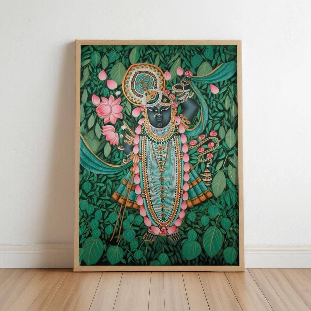The image is a framed painting depicting a figure in a green and gold outfit, surrounded by a lush green background with pink flowers and leaves.