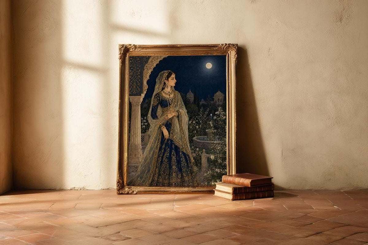 a painting of a woman in traditional Indian attire, standing in a courtyard at night with a full moon in the background. The painting is framed and placed on a tiled floor, with a stack of books and a lamp nearby.