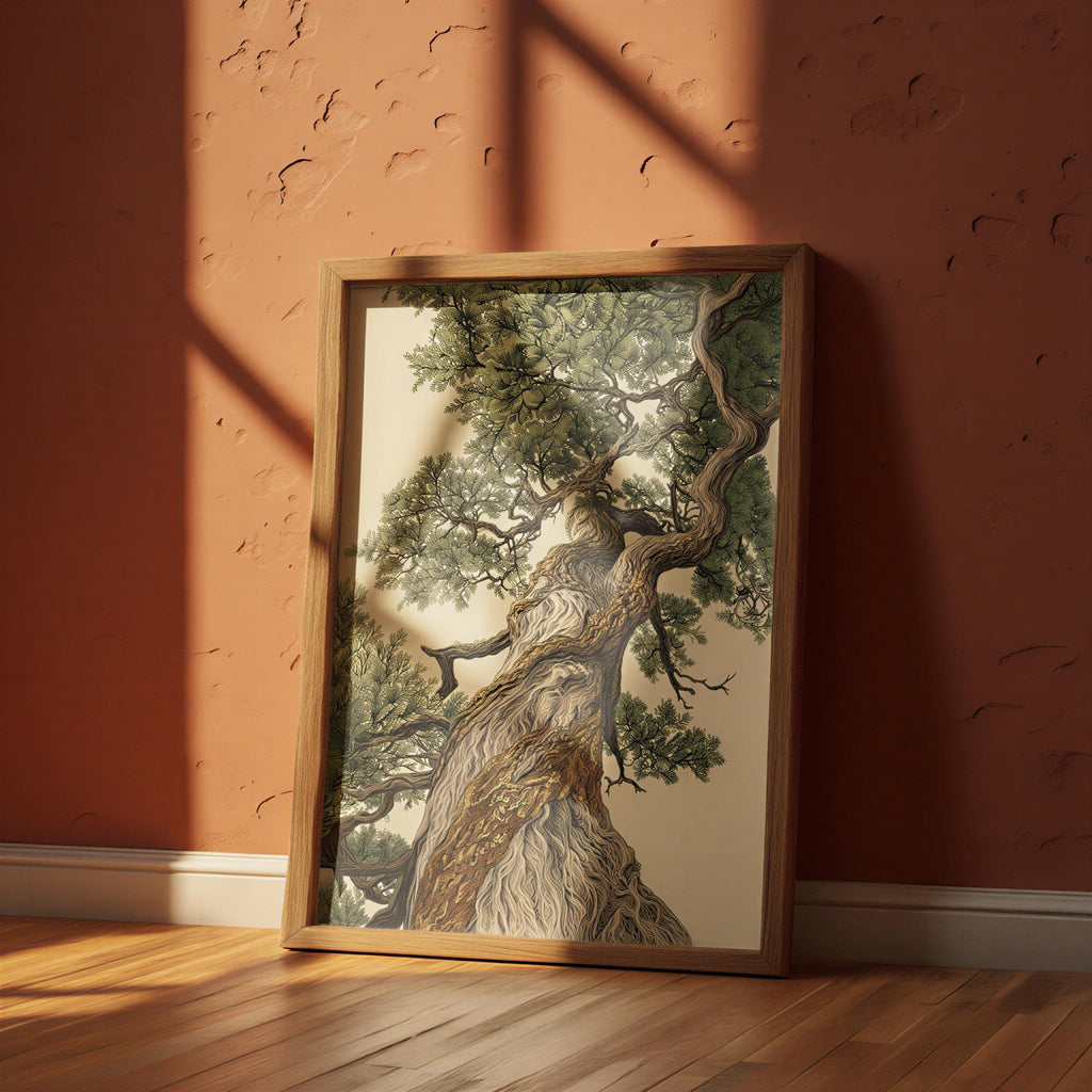 a large, detailed painting of a tree with a thick trunk and numerous branches, displayed in a wooden frame on a wooden floor against a red wall.