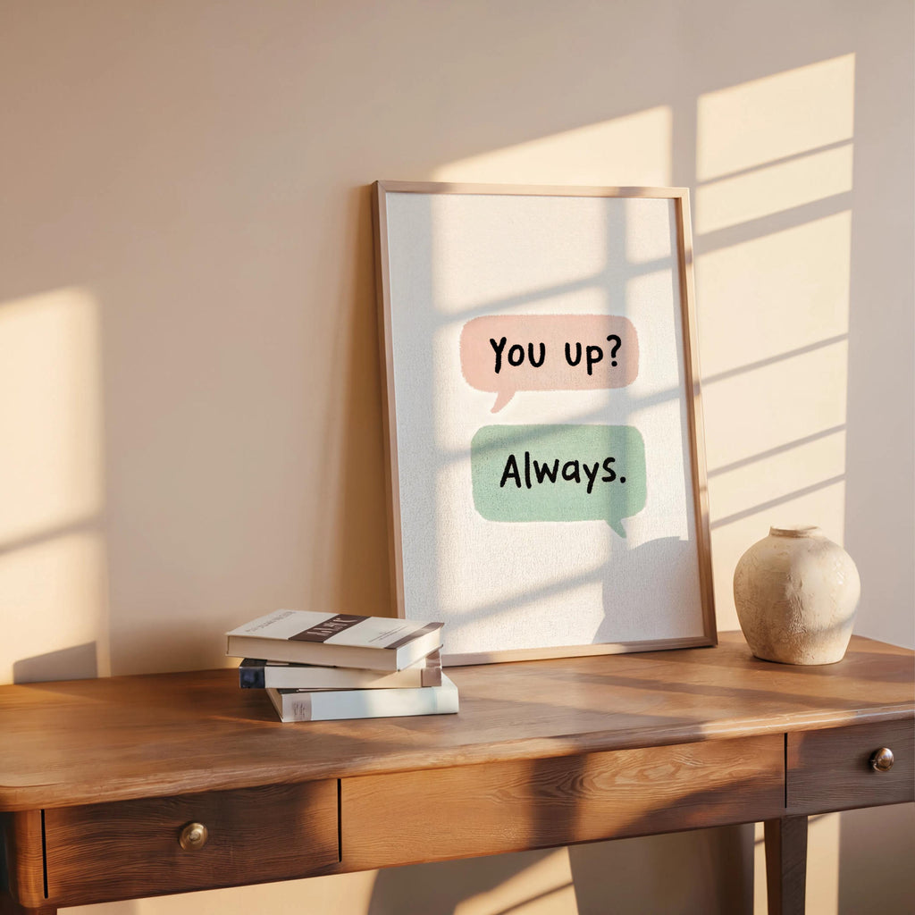 Cream textured couples text message print on desk, soft green "Always" bubble, subtle grain and cozy bedroom styling.