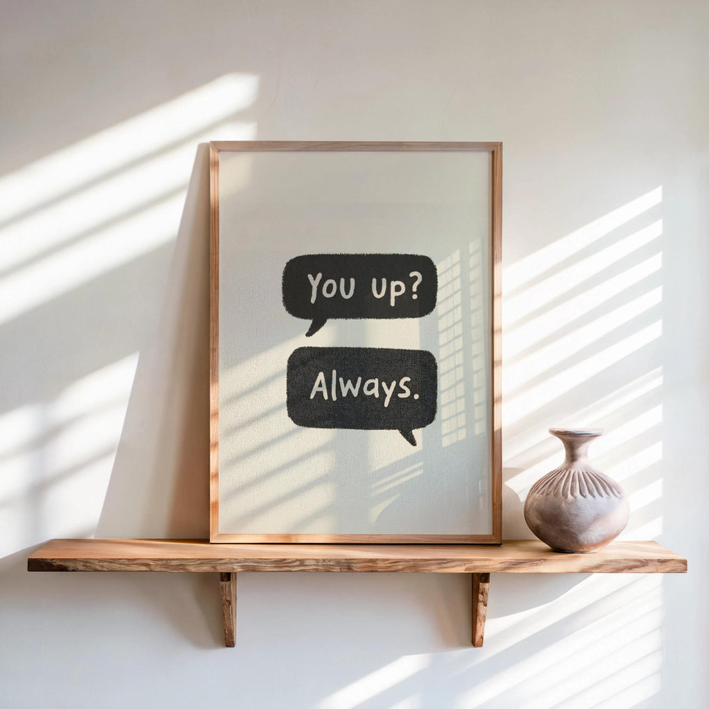 Neutral couples text message print on shelf, grainy background, bold black speech bubbles, funny couples wall art tone.