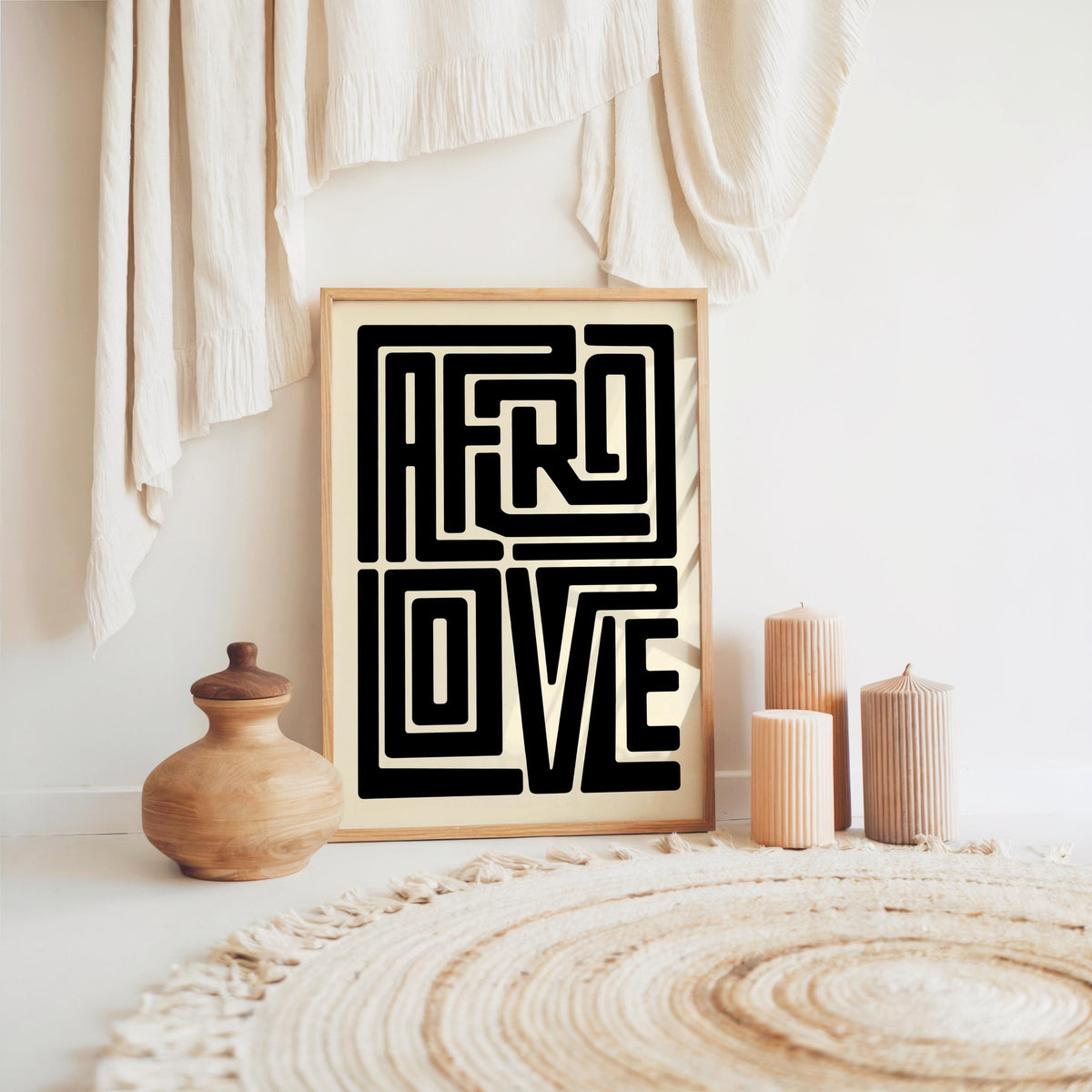 Afro Love wall art framed print on woven rug with clay pots and wooden decor, Afrocentric wall art poster styling