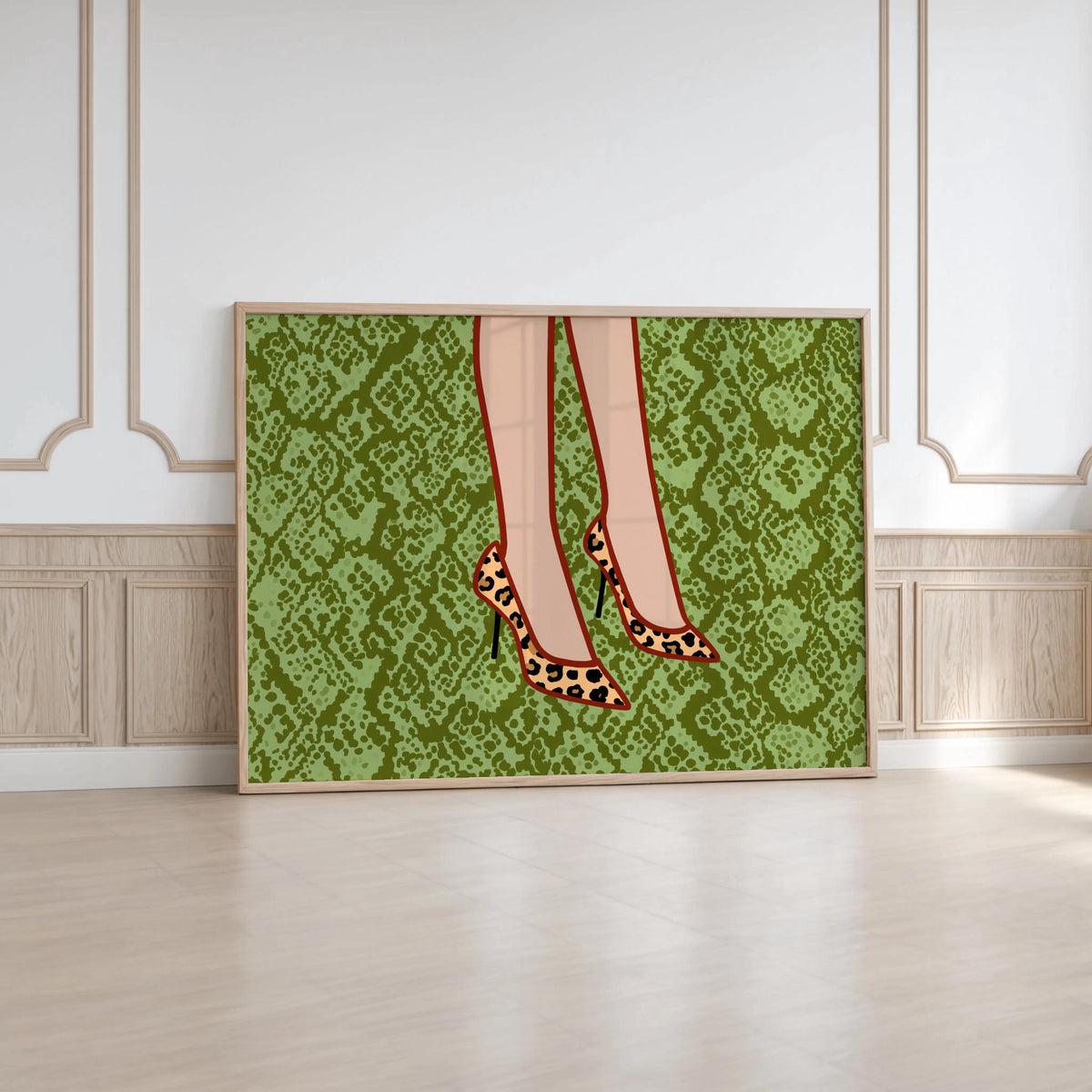 Vertical framed leopard print heels wall art propped against panelled wall, rich green snake-print, glam leopard pumps