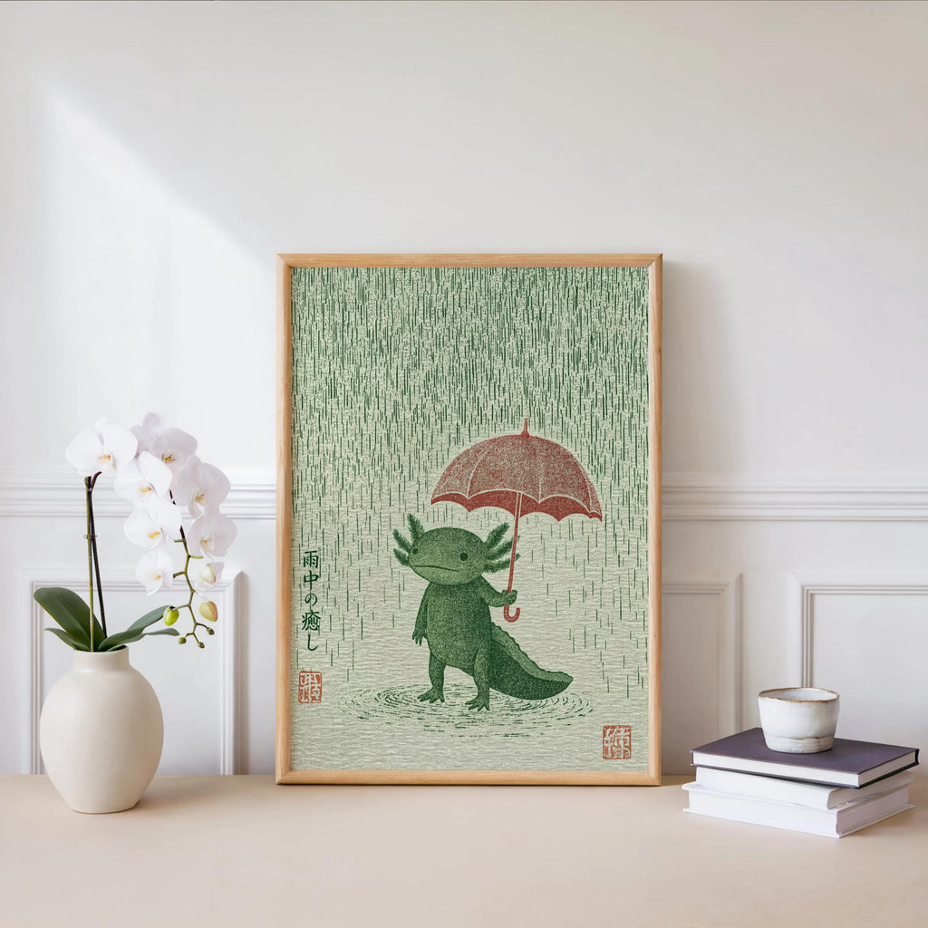 Framed Axolotl Wall Art Print on a console next to an orchid, kawaii axolotl art, woodgrain frame highlights texture
