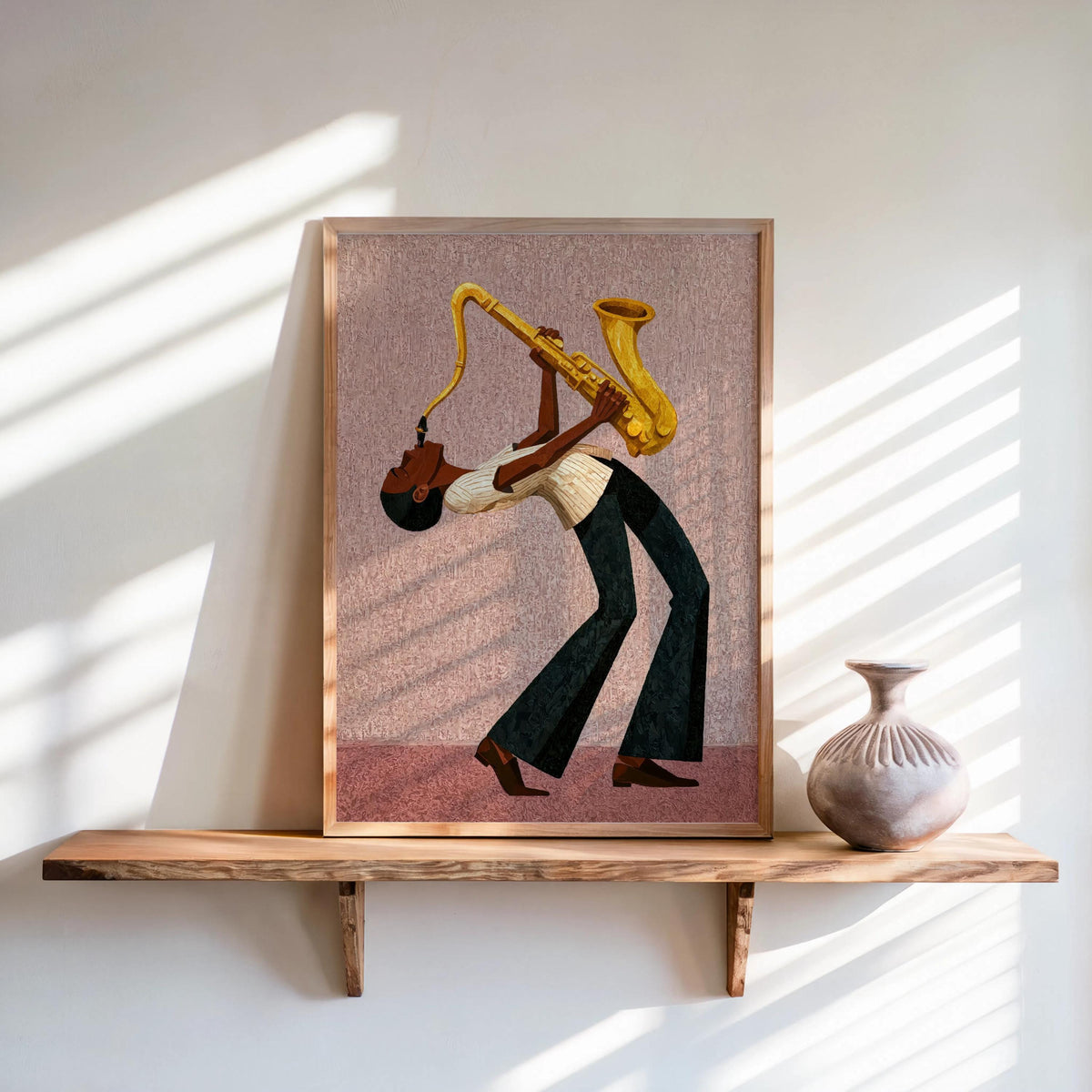 Framed afrocentric jazz wall art print, soft pink vintage backdrop, textured painterly shading and lines.