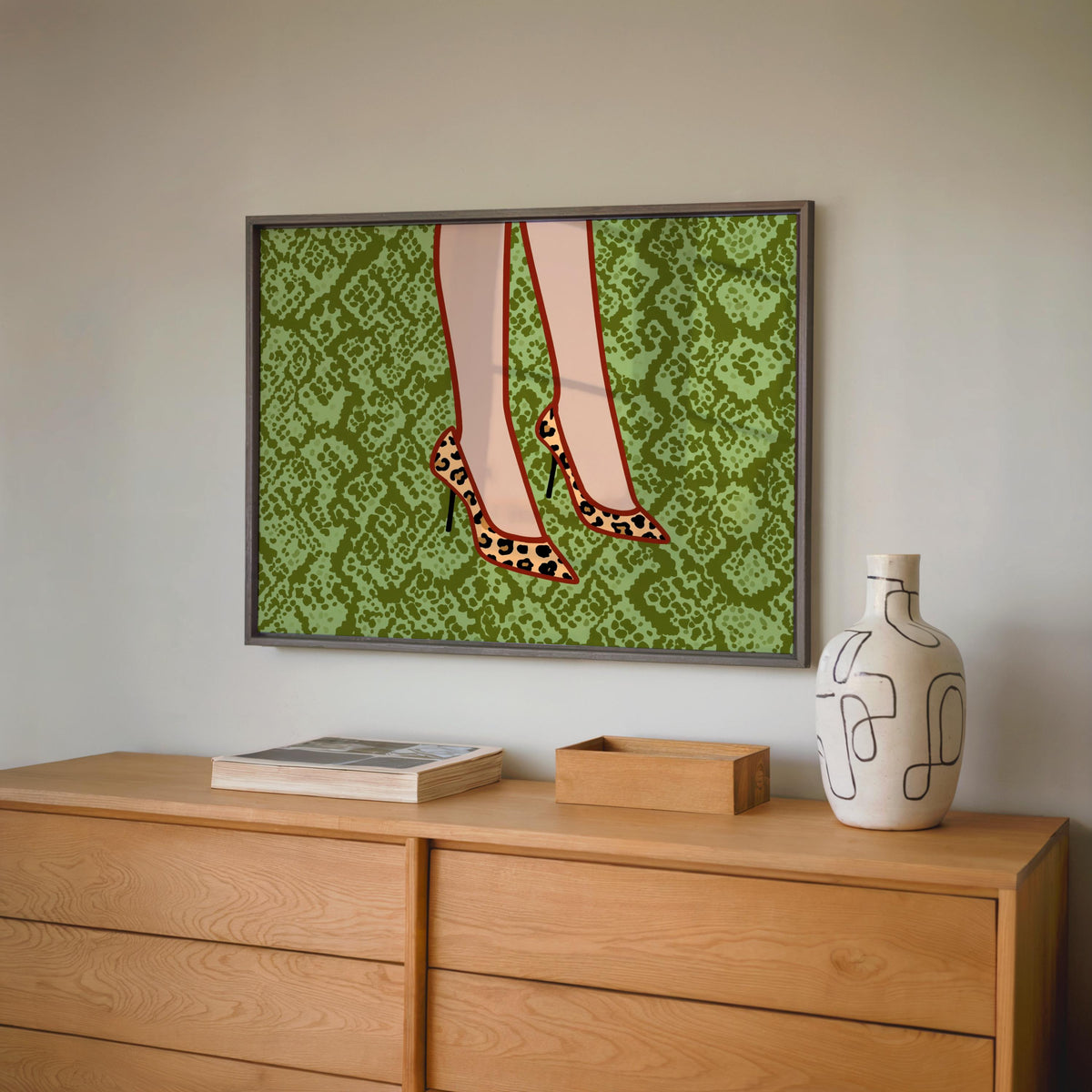 Wide framed leopard print heels wall art over wooden dresser, bold green snake texture, stylish feminine gift suggestion