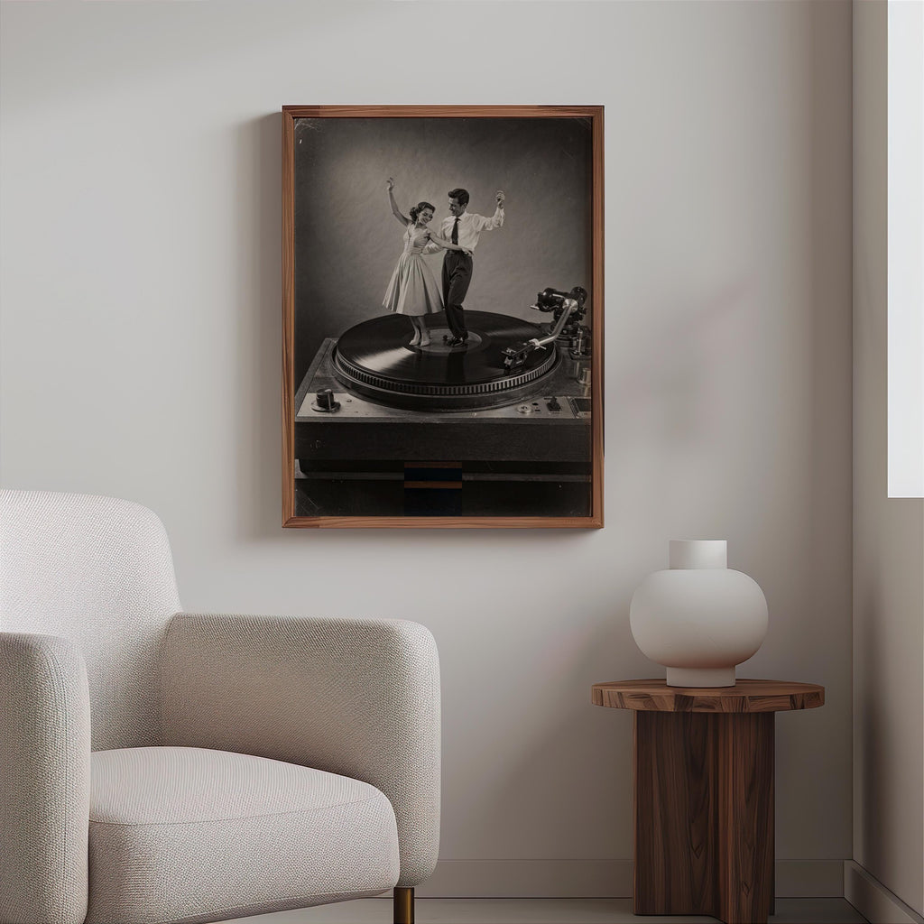 Black-and-white record player wall art above a cozy armchair and wood side table, textured decor styling