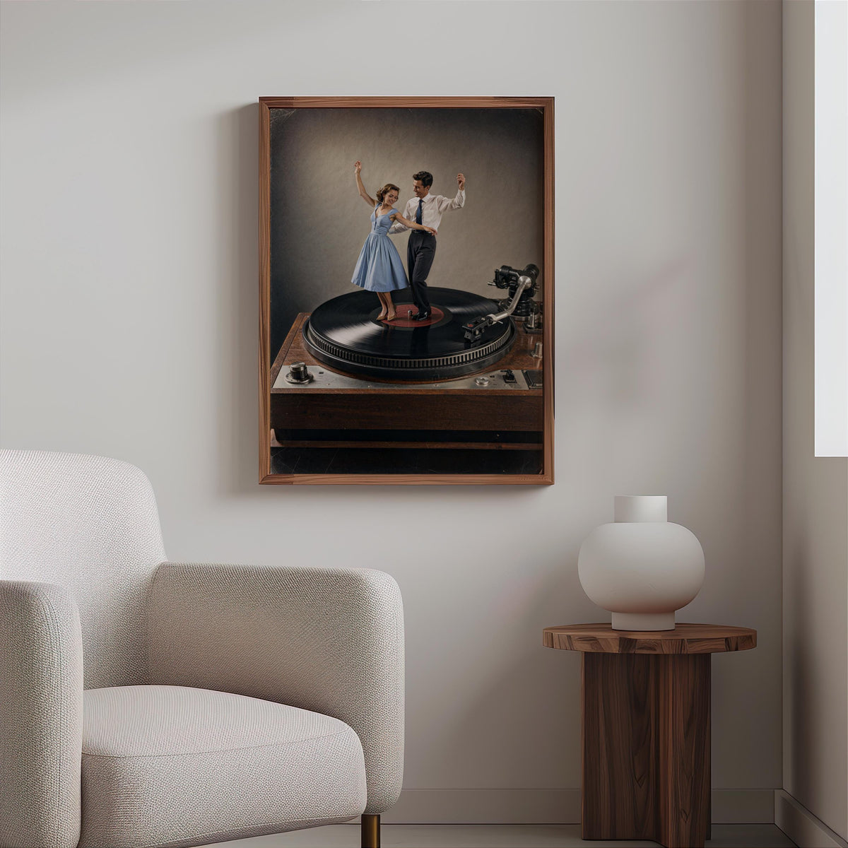 Color record player wall art above a boucle armchair, muted tones highlight the dancing couple on vinyl