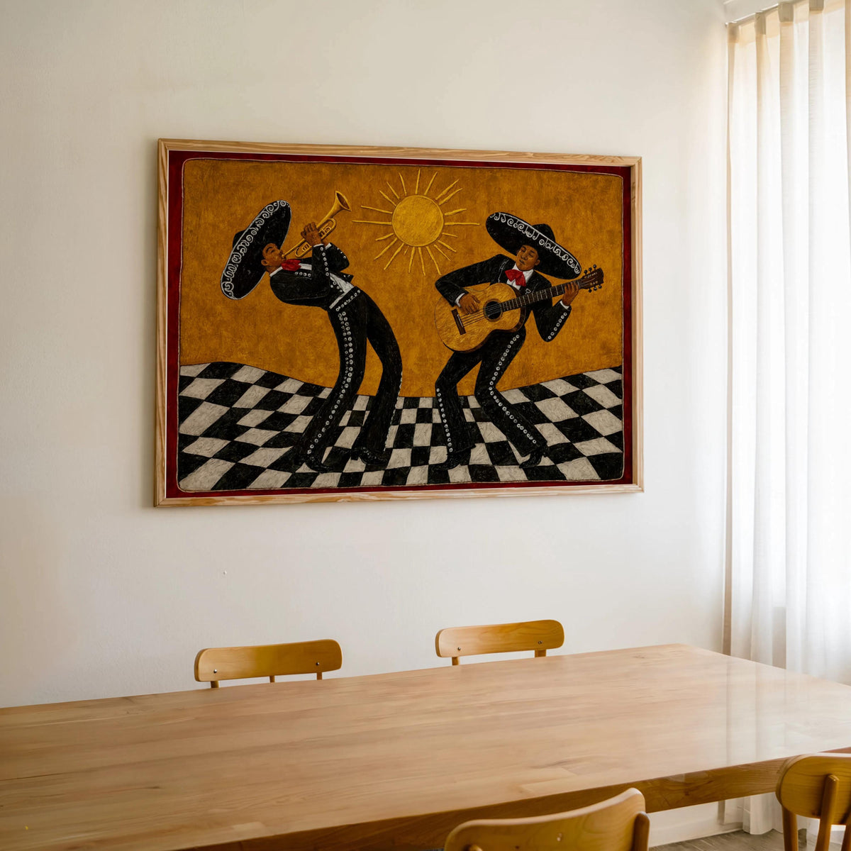 Framed mariachi art print centered above a wooden dining table, warm golden folk art tones