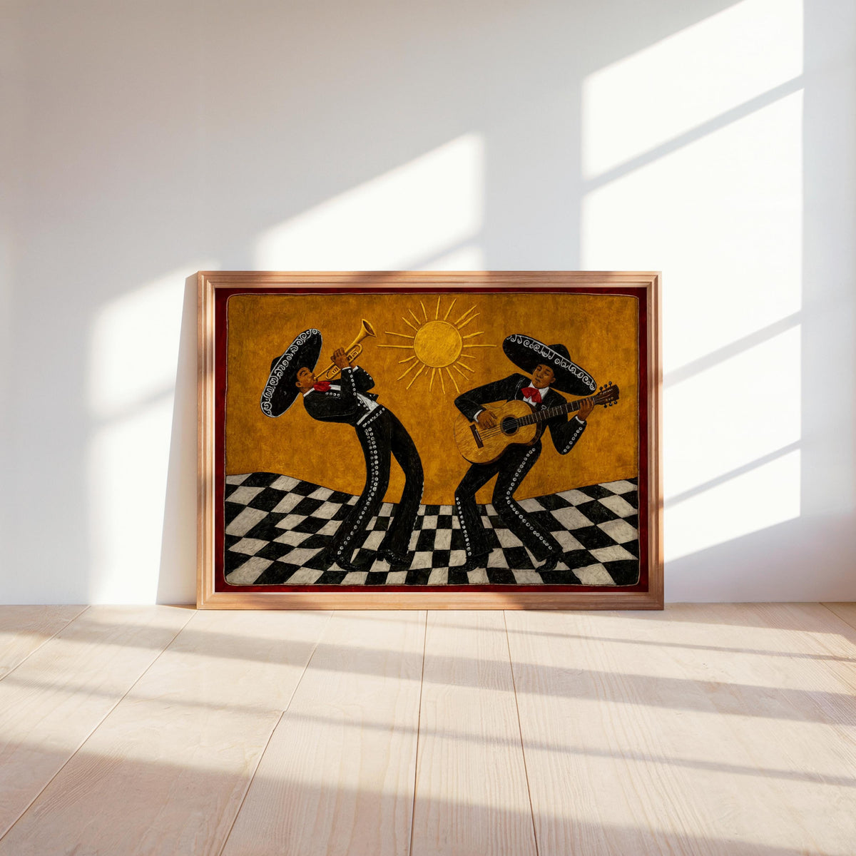 Sunlit mariachi wall art mounted on pale wall, trumpet and guitar silhouettes in vintage gold