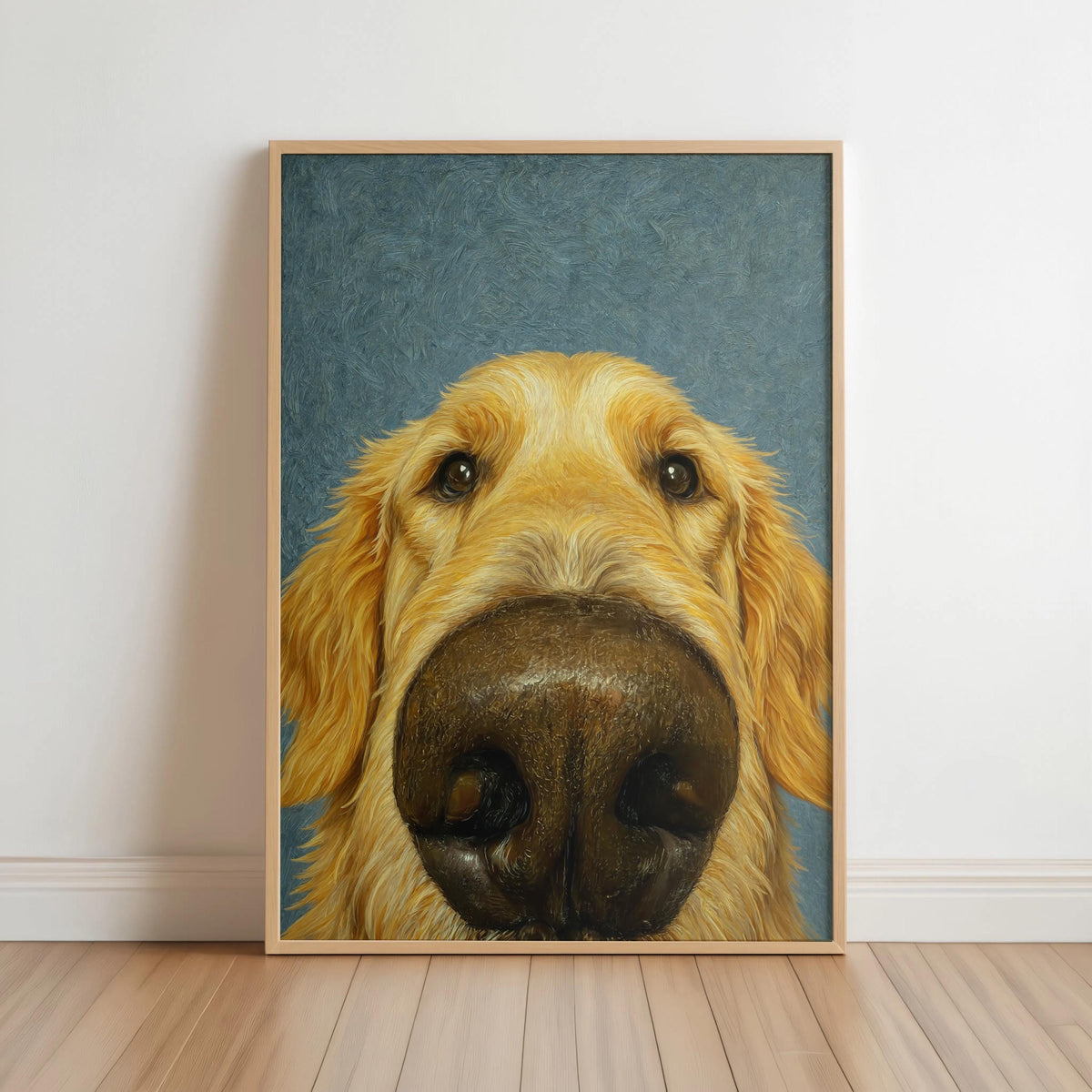 Framed print leaning on floor with blue background, playful golden retriever nose art close up