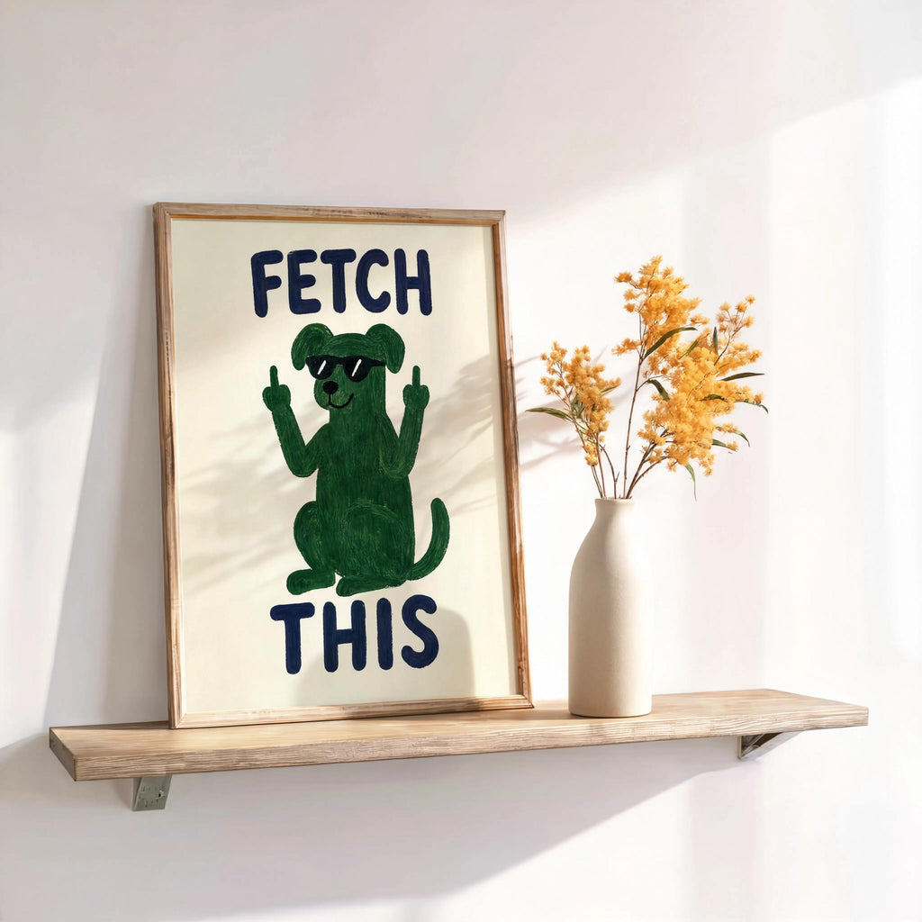 Wood shelf with framed green dog print and dried flowers, bold navy FETCH THIS text, dog lover wall art for entryways