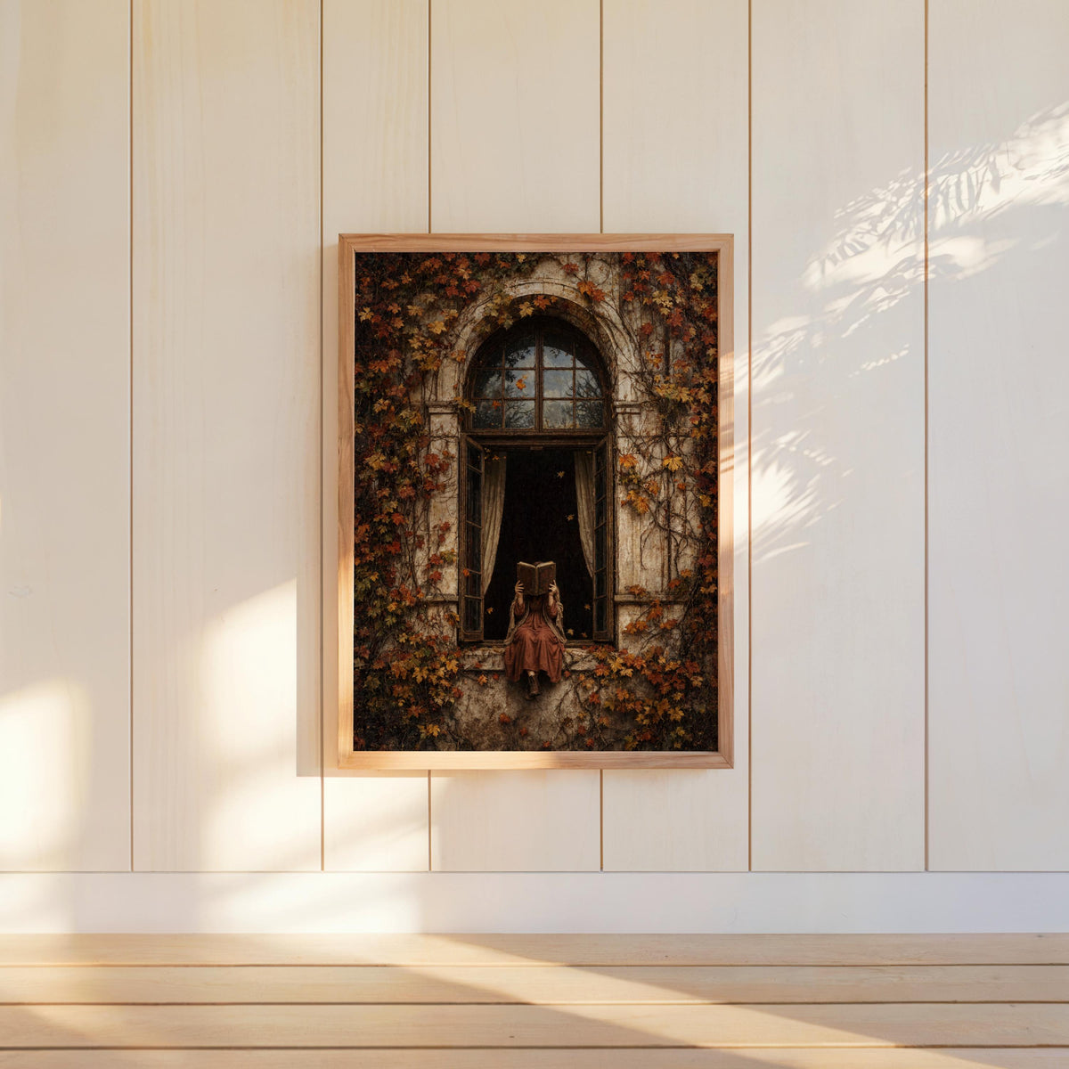 Wall hung woman reading art print on white shiplap, cottagecore book decor in autumn tones