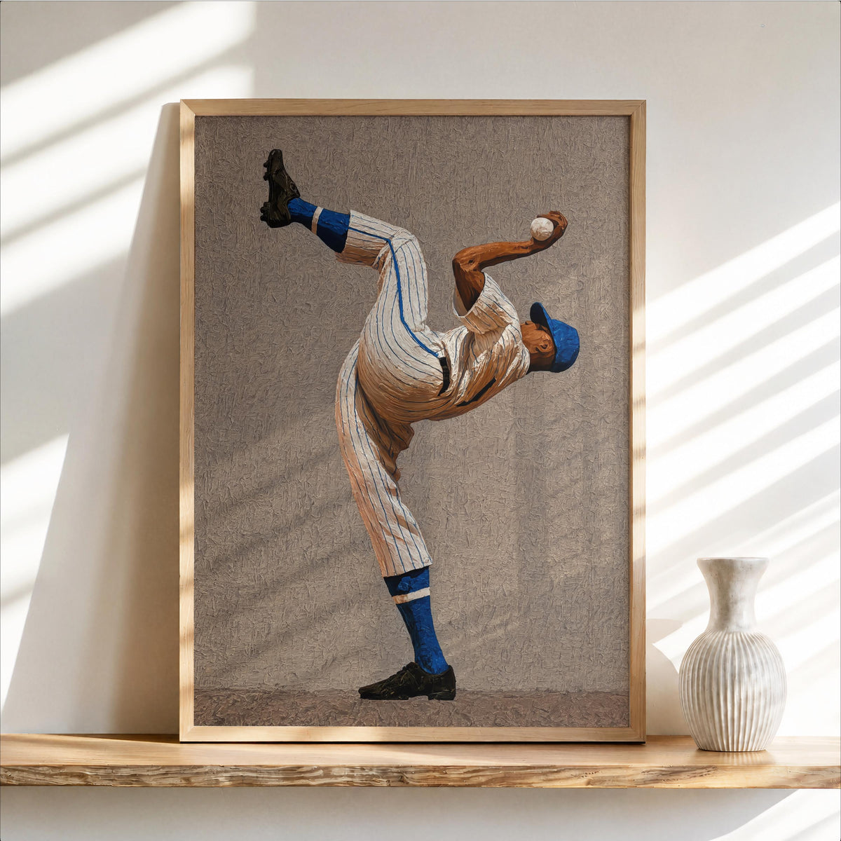 Framed portrait print with warm tan texture, stylized black athlete mid-windup, vintage-modern baseball pitcher wall art