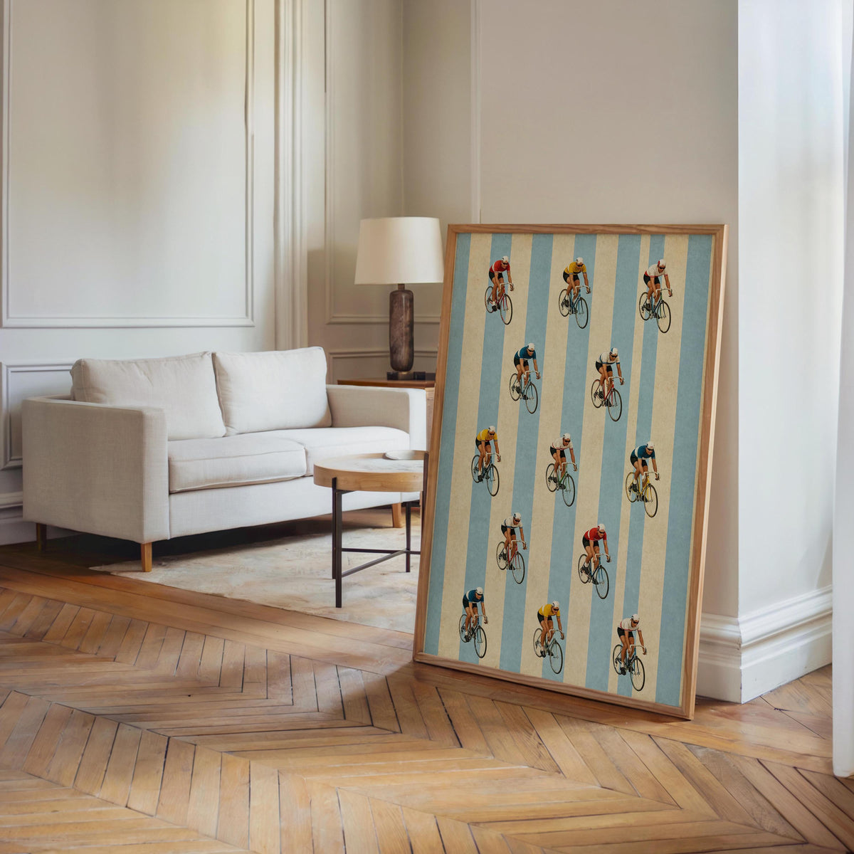 Retro cycling wall art freestanding in sunny living room, tall wood frame, pale blue stripe bicycle art print.