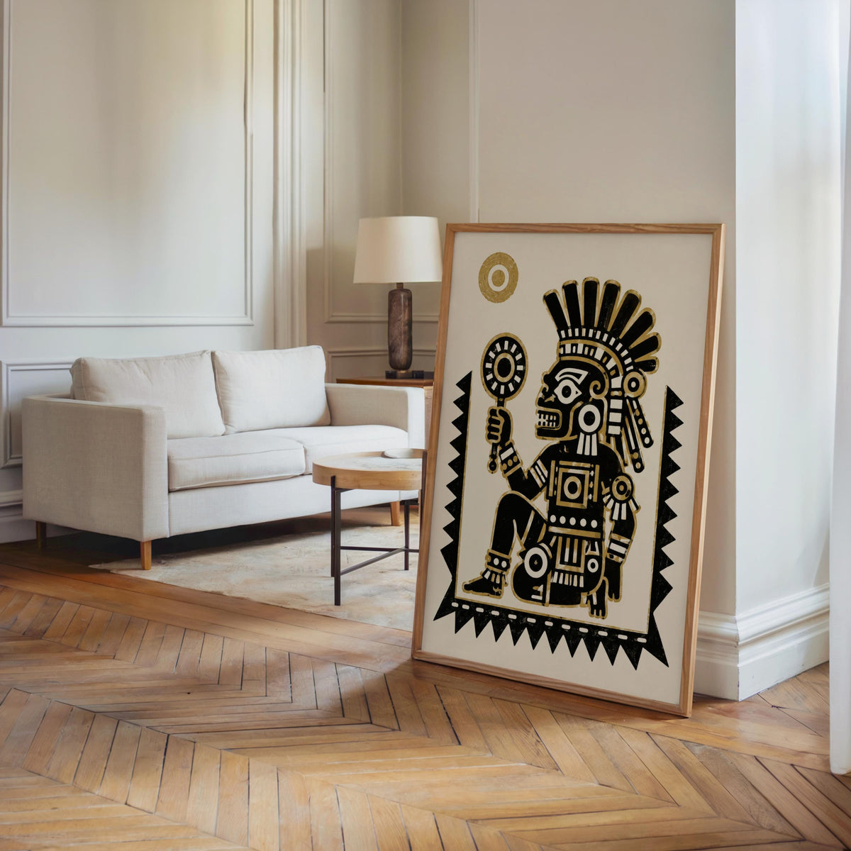 Large Tezcatlipoca art print leaning on hardwood floor in airy living room, Indigenous Mexican wall art vibe
