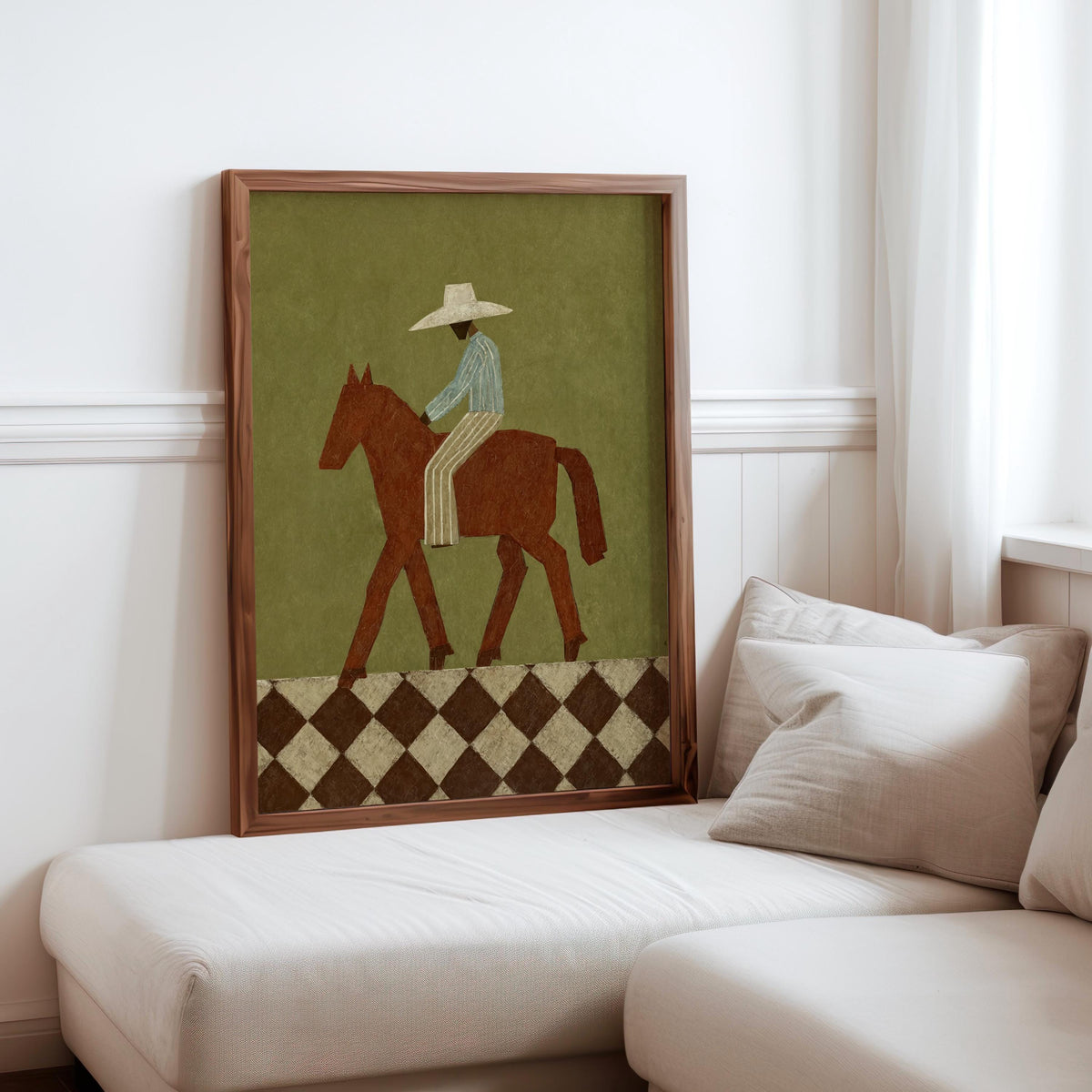 Framed cowboy horse print on a cozy sofa corner, rustic cowboy decor colors, olive green wall art accent