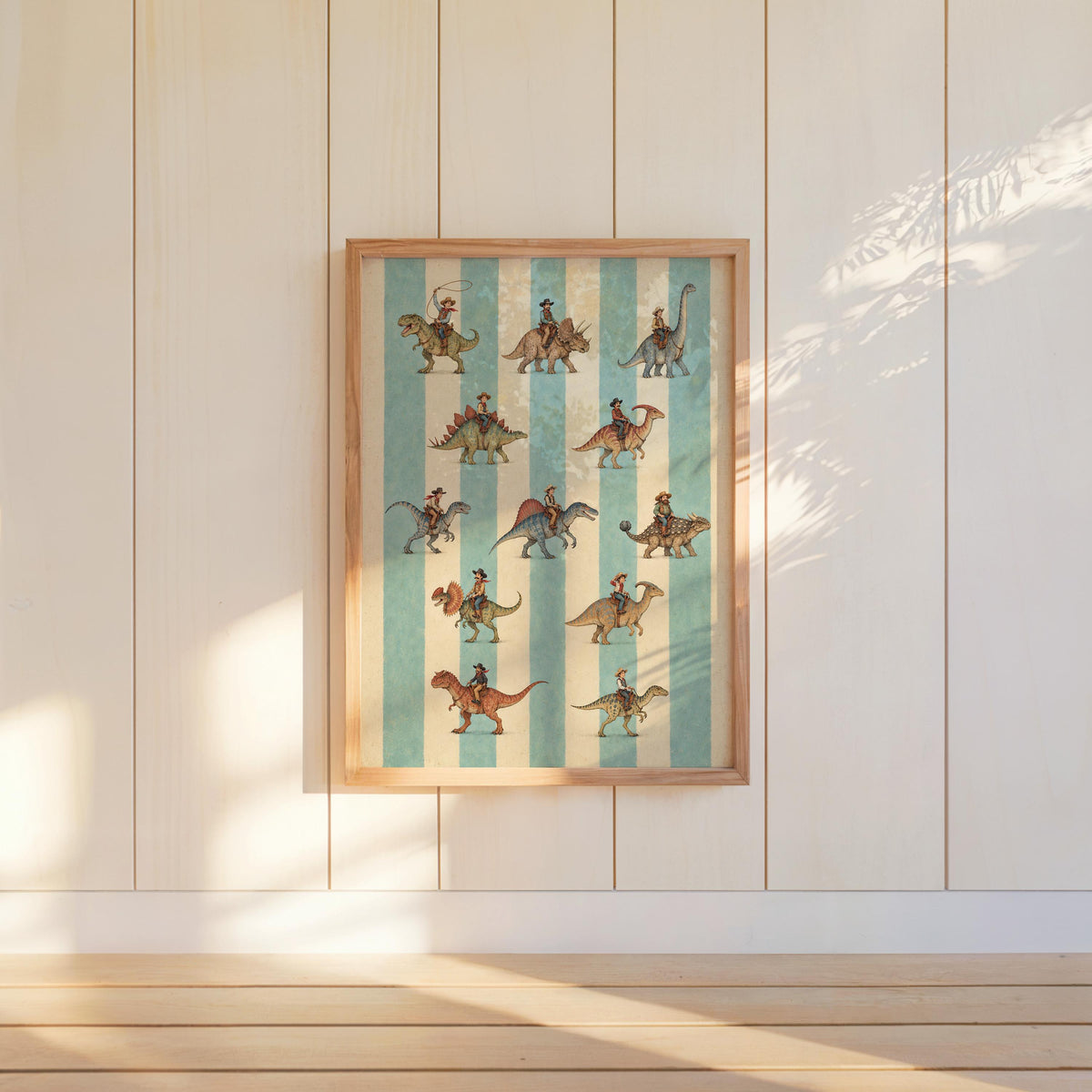 Tall cowboy dinosaur art print hung on white paneled wall, repeating tiny riders on colorful dinosaurs