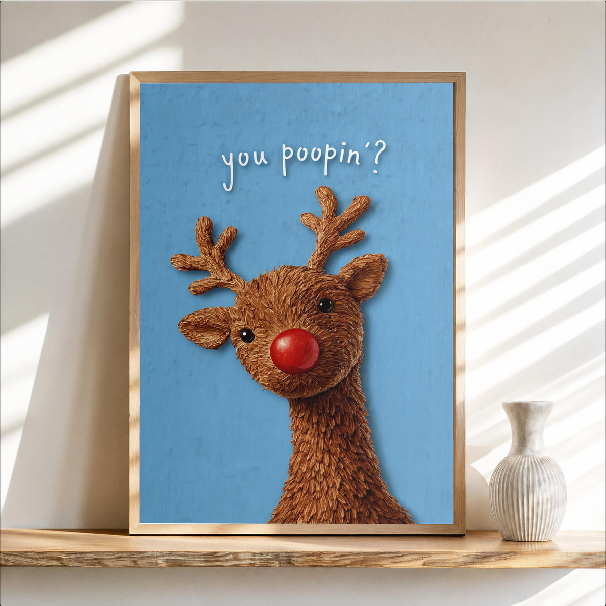 Powder blue Rudolph bathroom print, festive restroom art vibe, glitter-textured reindeer and playful toilet phrase