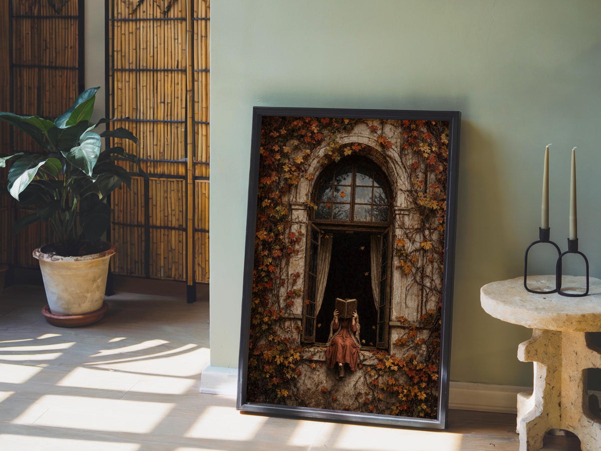 Leaning woman reading art print against sage wall, plant and candle props, deep shadowy palette