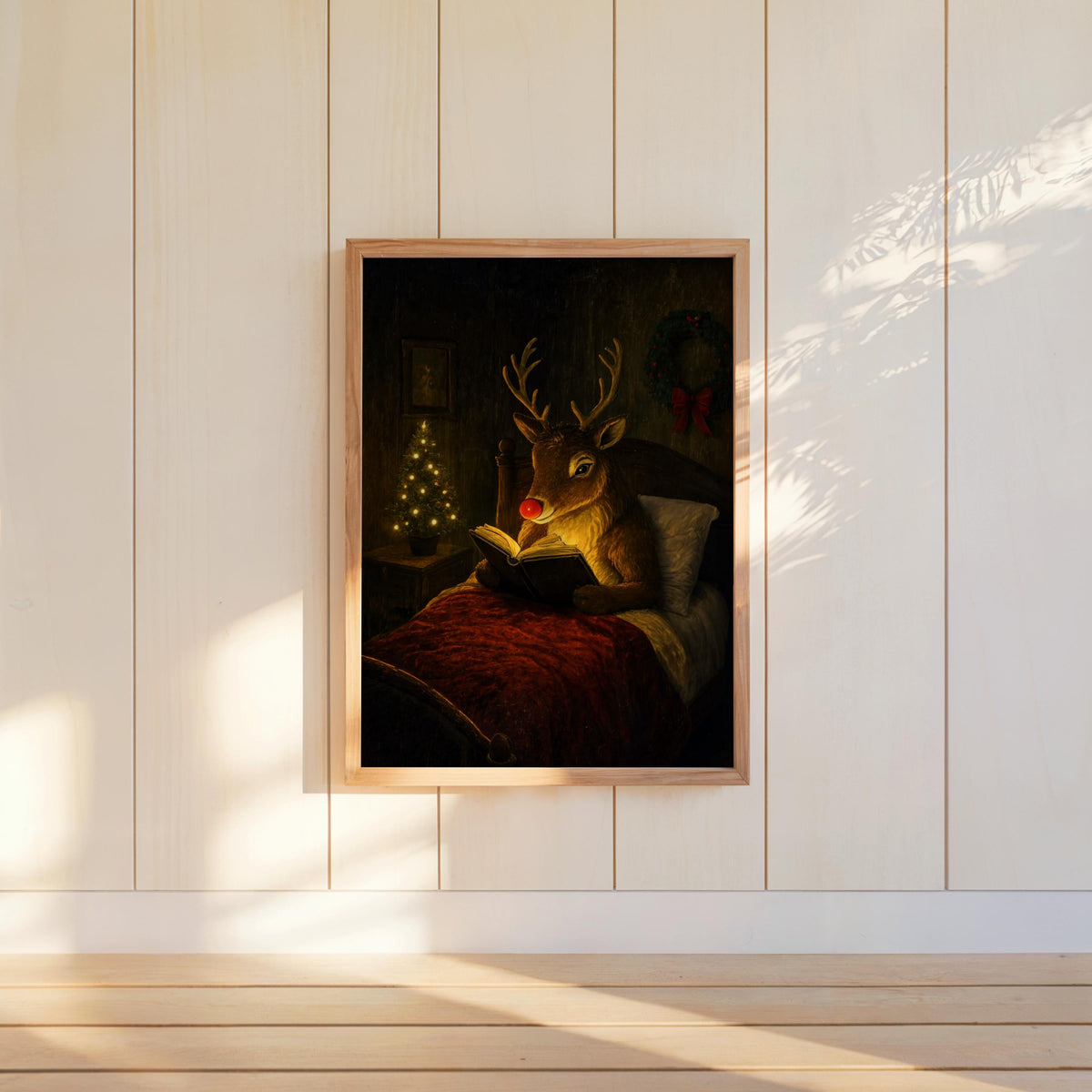 Rudolph Christmas wall art hung on white shiplap wall, moody woodland print, glowing booklight