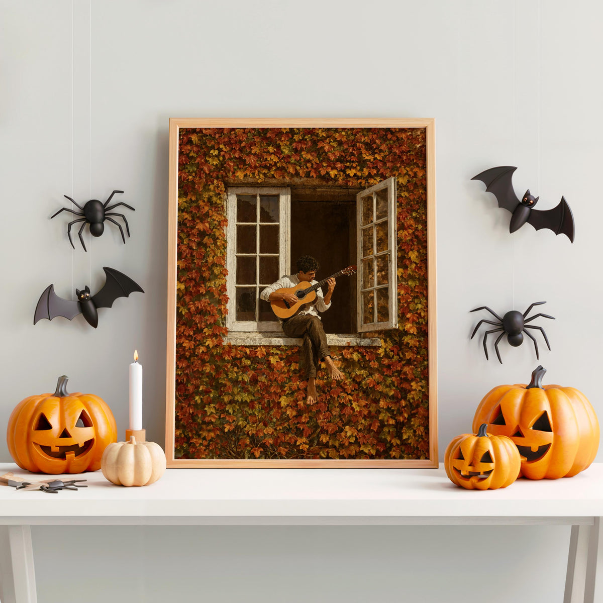 Halloween mantel scene, autumn guitarist wall art flanked by carved pumpkins and paper bats, cozy fall music wall decor.