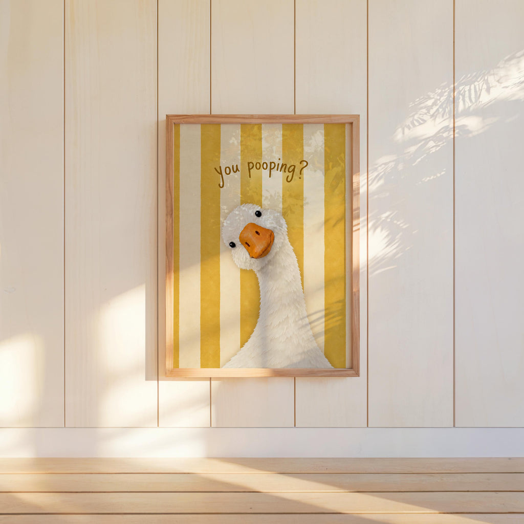 Yellow striped framed funny goose bathroom print mounted on wall, retro striped goose print for toilet humor