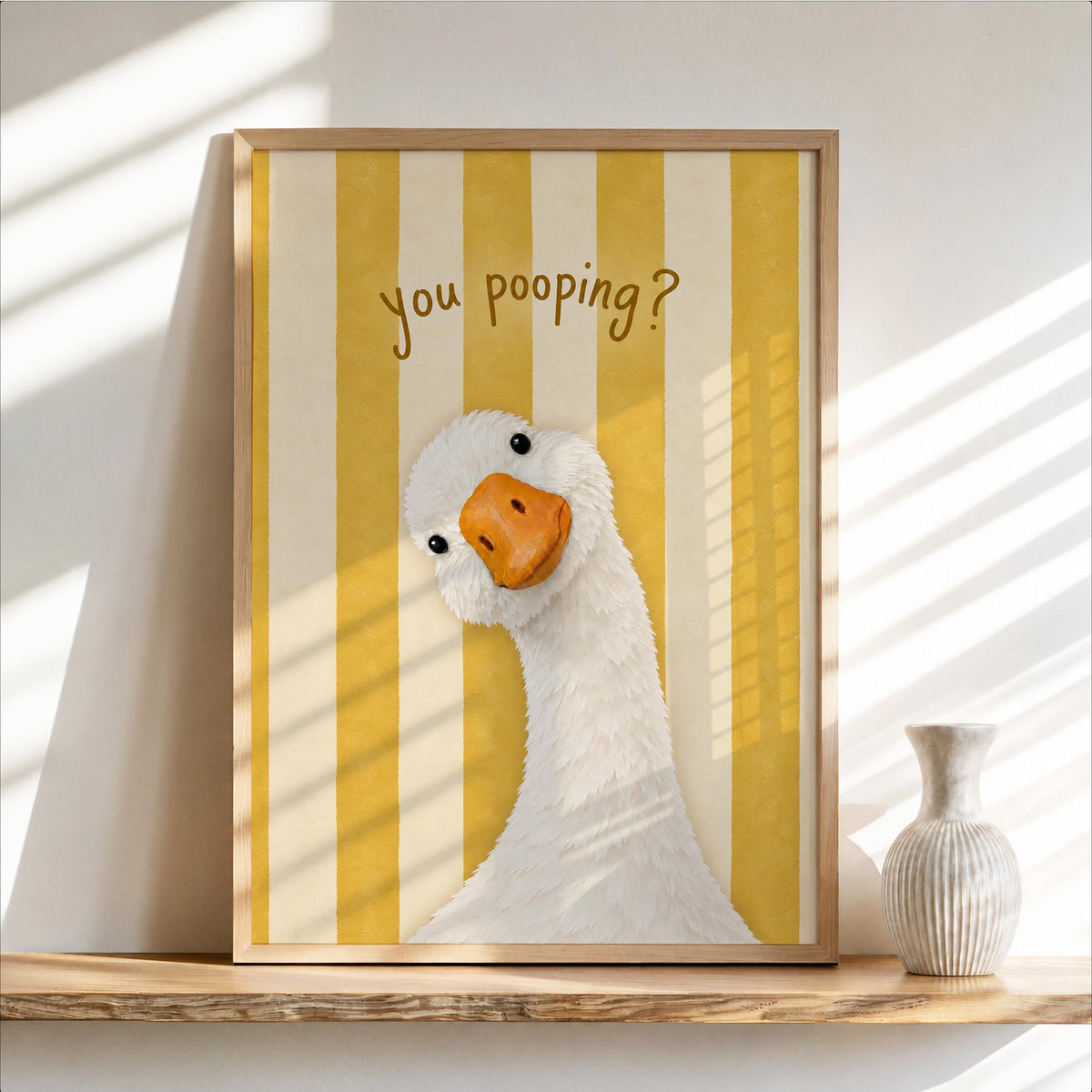 Yellow striped framed funny goose bathroom print, retro stripes, white goose head and humorous 'You pooping?' line